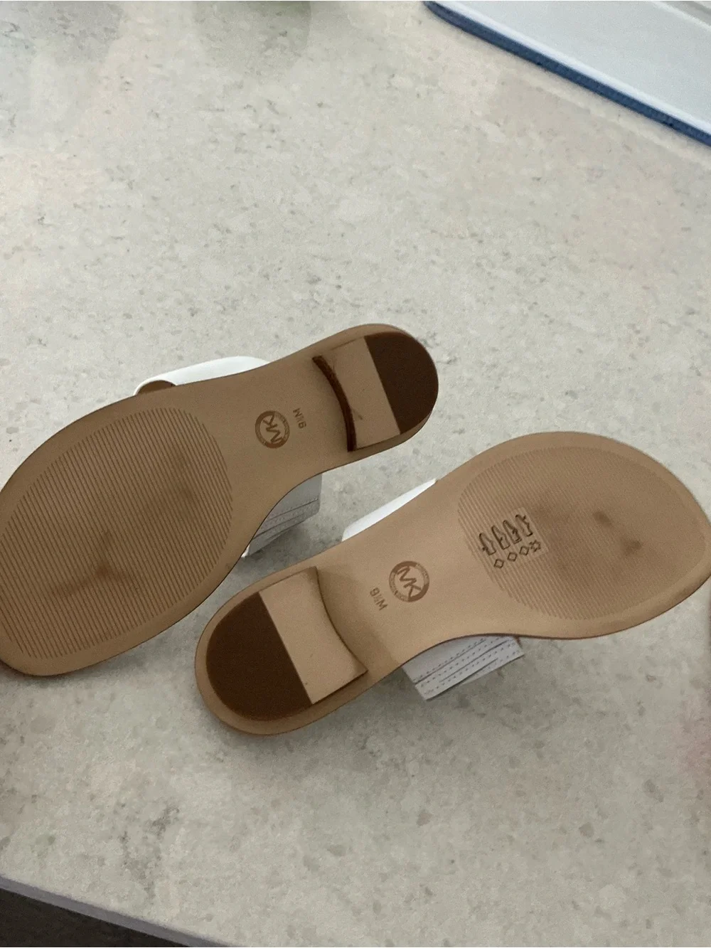 White Women’s Toe-Post Sandal damage peeling